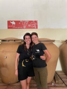 Two women in an organic Italian winery producing organic red Italian wines 